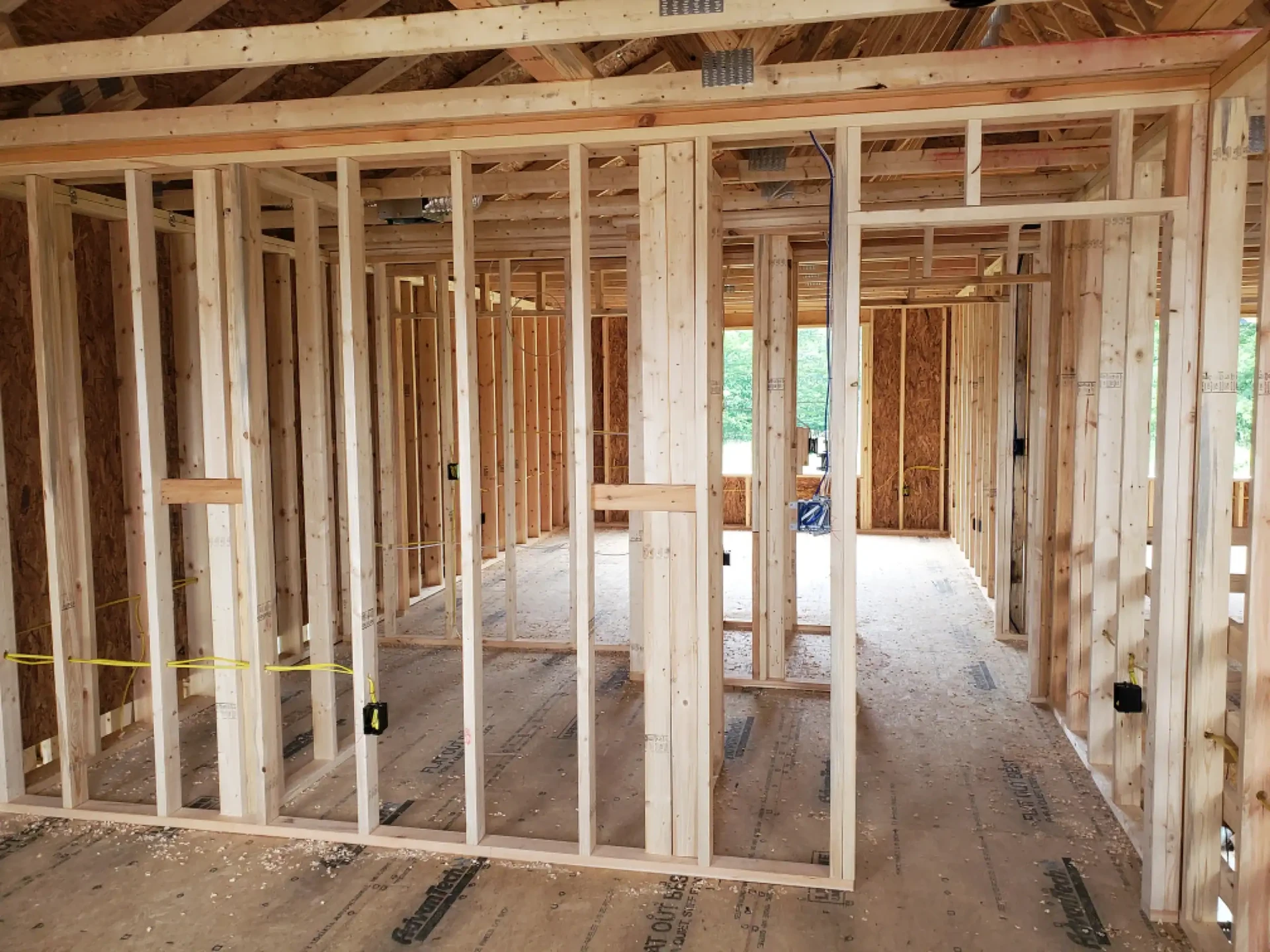 Framed new home with rough-in wiring and boxes on studs